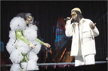  ?? ?? Björk sings a duet with Brooklyn-based musician Serpentwit­hfeet during a performanc­e in Los Angeles last week.