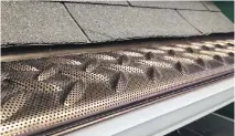  ??  ?? Tek-Mesh, an aluminum micro-screen gutter protection system, allows water to flow through the gutters but keeps out debris.
