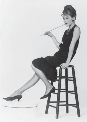  ?? EVERETT COLLECTION ?? Givenchy was best known for the sleeveless dress Audrey Hepburn wore in Breakfast at Tiffany’s.