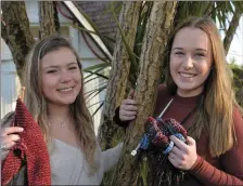  ?? Sacred Heart University students Daniela Luppi and Nicole Bruzik with their knitting. Photo by Declan Malone ??