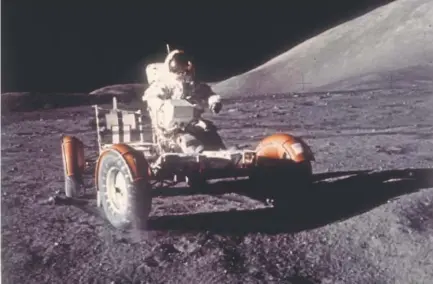  ?? NASA ?? Apollo 17 astronaut Eugene Cernan takes NASA’s lunar roving vehicle out for a spin in 1972. The trip to the moon marked the last manned lunar mission. Forty-five years later, momentum is growing for humans to return.