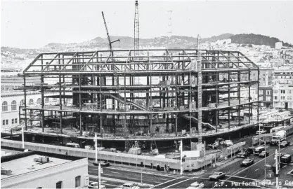  ?? PHOTOS COURTESY OF THE SAN FRANCISCO SYMPHONY ?? Above: A view of the constructi­on site for Davies Symphony Hall. Below left: Louise Davies, dressed as Mrs. Claus, decorates a tree in Davies Symphony Hall at an early Deck the Hall event. Below right: Invitation and program cover for the 20th annual Deck the Hall event in December 2000.