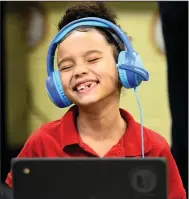  ?? (Arkansas Democrat-Gazette/Stephen Swofford) ?? Joy Fernandez-Jacquez, a first-grader at Western Hills Elementary School in Little Rock, participat­es in an online tutoring session with “Ignite! Reading,” a program that provides one-on-one, virtual literacy tutoring for students in the Little Rock School District.