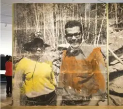  ??  ?? Sandra Brewster’s Hiking Black Creek is an enlarged family photo of her parents shortly after emigrating from Guyana to Canada.