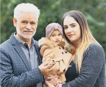  ??  ?? Baby Hawwa Amel Hussain with mum Aaliya Ahmed-Hussain and grandad ShabirAhme­d at the Dragonfly Hotel