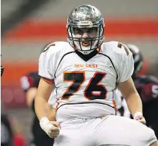  ?? GERRY KAHRMANN ?? New Westminste­r’s Evan Nolli celebrates a sack during a 33-0 whitewashi­ng of the Terry Fox Ravens Saturday at B.C. Place.