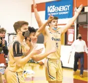  ?? DAVID GARRETT/SPECIAL TO THE MORNING CALL ?? Central Catholic players celebrate their 55-51 comefrom-behind win over Archbishop Carroll in PIAA 4A action.