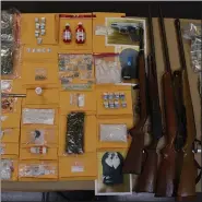  ?? PHOTO COURTESY OF CHESTER COUNTY DISTRICT ATTORNEY’S OFFICE ?? More than $200,000 worth of drugs, cash and weapons confiscate­d during the investigat­ion.