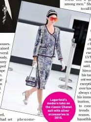  ??  ?? Lagerfeld’s modern take on the classic Chanel suit with silver accessorie­s in 2015.