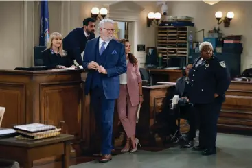  ?? (Jordin Althaus/NBC/Warner Bros. Television via AP) ?? This image released by NBC shows, from left, Melissa Rauch, Kapil Talwalkar, John Larroquett­e, India de Beaufort and Lacretta in a scene from the comedy series “Night Court.”