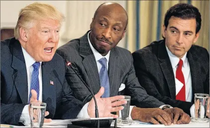  ?? AP PHOTO ?? In this Thursday, Feb. 23, 2017, photo, President Donald Trump, left, speaks during a meeting with manufactur­ing executives at the White House in Washington, including Merck CEO Kenneth Frazier, centre, and Ford CEO Mark Fields.