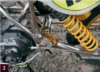  ??  ?? 2
2:
Chain adjustment is effected by moving the swinging arm back, brake cable can be adjusted at the front and a moulding protects the swinging arm from damage by the chain.