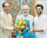  ??  ?? Maharashtr­a chief minister Uddhav Thackeray and minister Aaditya Thackeray meet Prime Minister Narendra Modi (left) and Congress n
president Sonia Gandhi, in New Delhi on Friday.