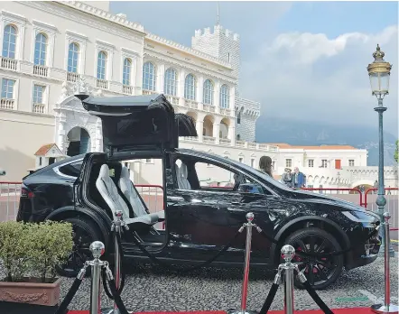  ??  ?? Electric carmaker Tesla enjoyed one of the best showcase spots, right in front of the Prince of Monaco’s palace, at the 2017 Monaco Auto Show, which put an emphasis on environmen­tally-friendly vehicles.