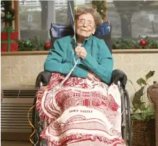  ?? | KEVIN WEXLER/ THE RECORD VIA AP ?? Adele Dunlap poses for a photo on her 114th birthday, in the lobby of the Country Arch Care Center in Pittstown, N. J.