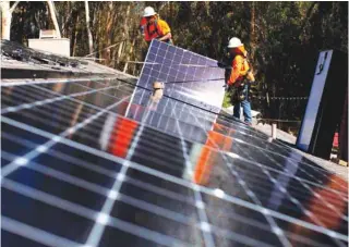  ?? – Reuters file picture ?? HEAVY DUTY: China, the world’s biggest solar panel producer branded the move an “overreacti­on” that would harm the global trade environmen­t for affected products.