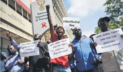  ?? Picture: Jacques Nelles ?? ANGRY. Taxi drivers protested outside the department of transport in Pretoria in March against other taxi services like Uber, Tuk Tuks and Zebra cabs, saying these services don’t adhere to the same regulation­s.