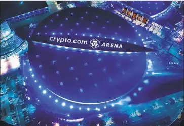  ?? ?? A RENDERING touts the new name of the downtown Los Angeles sports and concert venue now known as Staples Center. Crypto.com reportedly paid more than $700 million for the naming rights in a 20-year deal.