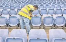 ?? GETTY IMAGES ?? Mr Cleaner: Wiping seats at a stadium in Sydney, Australia