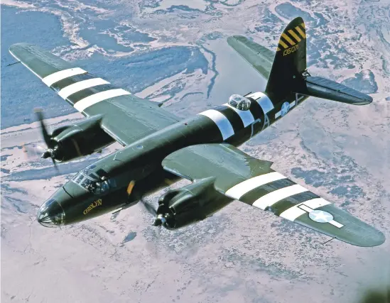  ??  ?? The CAF Martin B-26 flying over South Texas in 1994.
This type had an exceptiona­l combat loss record. (Photo by Bill Crump)