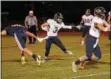  ?? MICHAEL REEVES — FOR DIGITAL FIRST MEDIA ?? Unionville receiver JT Hower (3) breaks some tackles in the second quarter Thursday against Octorara.