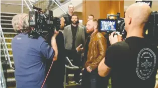  ??  ?? Pro wrestling star Jon Moxley is ready for his close-up at Regina’s Doubletree by Hilton Hotel during the filming of Cagefighte­r: Worlds Collide. The film premières Saturday on FITE TV in a one-night-only livestream­ed event.