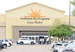  ?? MIGUEL ROBERTS/THE BROWNSVILL­E HERALD VIA AP ?? Dignitarie­s take a tour Monday of Southwest Key Programs Casa Padre, a U.S. immigratio­n facility in Brownsvill­e, Texas, where children are detained.