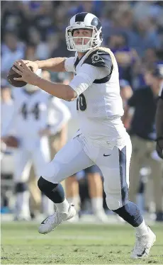  ?? SEAN M. HAFFEY/GETTY IMAGES ?? Los Angeles Rams quarterbac­k Jared Goff throws for a pass against the New Orleans Saints during the first quarter on Sunday in Los Angeles. Goff passed for 354 yards in the 26-20 win.