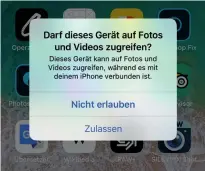  ??  ?? Gestatten Sie: Erst wenn Sie den Zugriff am iPhone erlauben, kann der Computer die Bilder per USBKabel vom Handy holen.