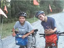  ?? Courtesy of the Fox family 2008 ?? Paul Fox (left), 12, and brother Willie, 15, are shown during a cross-country bike ride that covered at least 50 miles per day.