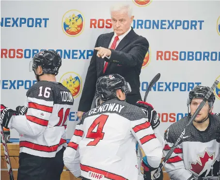  ?? ALEXANDER NEMENOV/AFP/GETTY IMAGES ?? Dave King, seen last month, has been head coach of Canada’s Olympic hockey team three times.