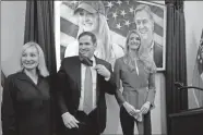  ?? AP-John Bazemore ?? Sen. Marco Rubio, R-Fla., stands with Georgia Republican candidate for Senate Kelly Loeffler, right, and Bonnie Perdue, wife of Sen. David Perdue, R-Ga., after a campaign rally Wednesday in Marietta.