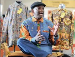  ?? PICTURE: PABALLO THEKISO ?? MADIBA SHIRTS: Designer Sonwabile Ndamase with his famous Madiba shirts.