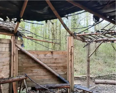  ??  ?? Damage caused to the roundhouse shelter at Mynydd Mawr Park, Tumble,