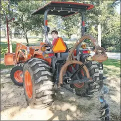  ??  ?? The Scouts built a gaga ball court at Pea Ridge’s City Park as part of a project to earn a Bronze Award. A tractor was used to dig poles for the upright posts.