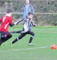  ??  ?? Llwydcoed’s Taylor Holland Ball makes a run