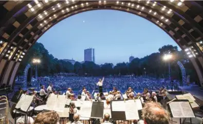  ?? ARAM BOGHOSIAN FOR THE BOSTON GLOBE ?? See the Boston Landmarks Orchestra at the Hatch Shell on Aug. 28.