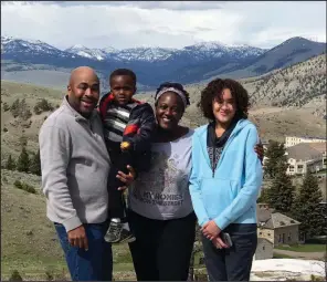  ?? (Special to The Washington Post) ?? “I do not want my children operating in fear. I do not want them operating in a mindset that all hope is lost,” says Heather McTeer Toney (center) with her family on a visit to Yellowston­e National Park.