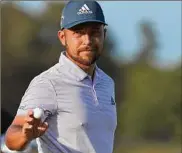  ?? Kevin C. Cox / Getty Images ?? American Xander Schauffele carded a 4-under 66 to take a two-stroke lead into Sunday’s final round of the Scottish Open at The Renaissanc­e Club in North Berwick, Scotland.