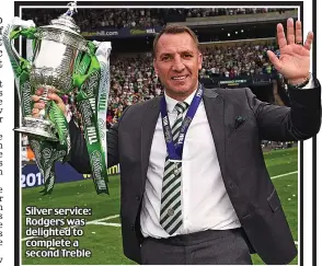  ??  ?? Silver service: Rodgers was delighted to complete a second Treble