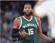  ?? ASSOCIATED PRESS ?? Bucks center Greg Monroe argues after he was called for a foul against the Nuggets in the first half.