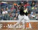  ?? THE ASSOCIATED PRESS ?? Everything Must Go! Miami continued its clearance sale under Derek Jeter by dealing outfielder Marcell Ozuna to the St. Louis Cardinals on Wednesday.