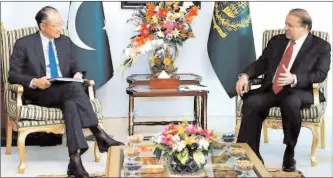  ??  ?? Dr. Jim Yong Kim, President World Bank calls on Prime Minister Muhammad Nawaz Sharif at PM House.