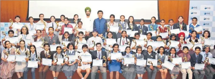  ??  ?? Director public instructio­ns (schools), Chandigarh, Rubinderji­t Singh Brar and former IAS officer and motivation­al speaker Vivek Atray with the 50 winners of the Hindustan Times Scholarshi­p Programme 201718 at the Indian School of Business in Mohali...