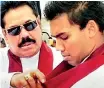  ?? ?? DREAMS DIE HARD: Mahinda, in the halcyon days of his rein, grooming son and adding the finishing touches of how to don the Rajapaksa purple with flamboyant flair