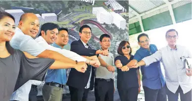  ??  ?? Representa­tives from different sectors, led by POC executive director Patrick Gregorio, put their fists together in a display of unity during the start of the constructi­on of the Philippine training center in Clark, Pampanga (right).