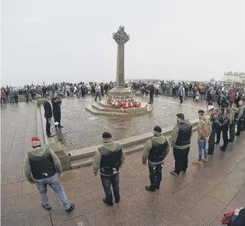  ??  ?? A group of 15 Armed Forces veterans took turns to spend an hour on duty on the Terrace Green.