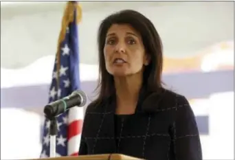  ?? RAAD ADAYLEH — THE ASSOCIATED PRESS ?? Nikki Haley, the U.S. ambassador to the United Nations , speaks to a crowd of US foreign service members at the American embassy in Amman, Jordan on Monday. Haley is pledging additional support for refugees fleeing Syria’s long civil war.