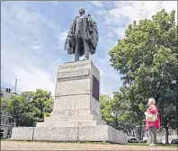  ?? CP PHOTO ?? A statue of Edward Cornwallis in a Halifax park is shown in this file image. Organizers say a protest calling for a statue of Halifax’s controvers­ial founder to be toppled will proceed as planned, despite objections from Mi’kmaq leaders.