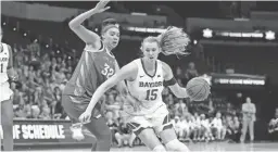  ?? ALONZO ADAMS/AP ?? Baylor forward Lauren Cox drives to the basket around Iowa State forward Meredith Burkhall during the Big 12 tournament championsh­ip game on March 11 in Oklahoma City.